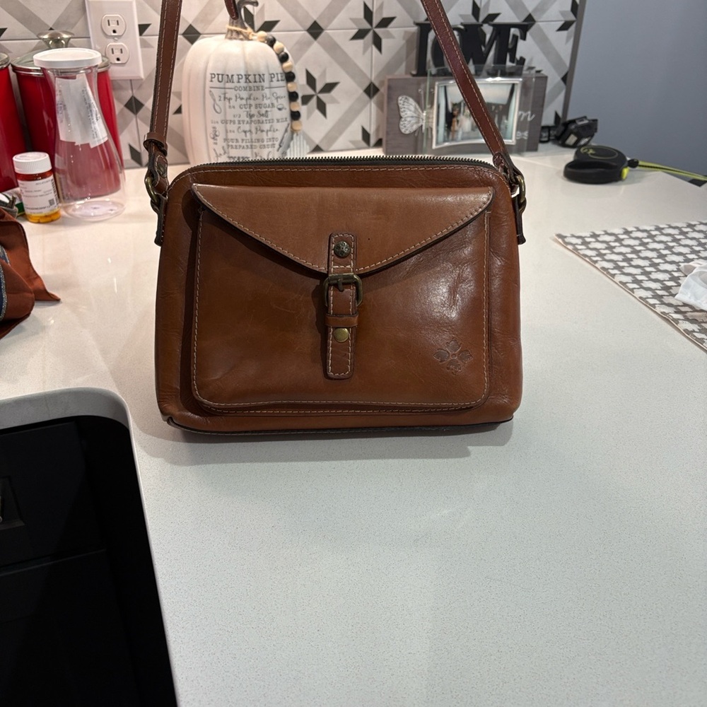 Patricia Nash all leather with velour interior